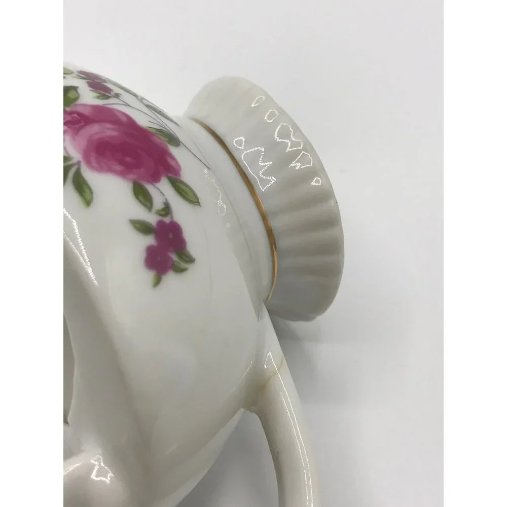 Vintage made in Japan small porcelain gravy/sauce boat.